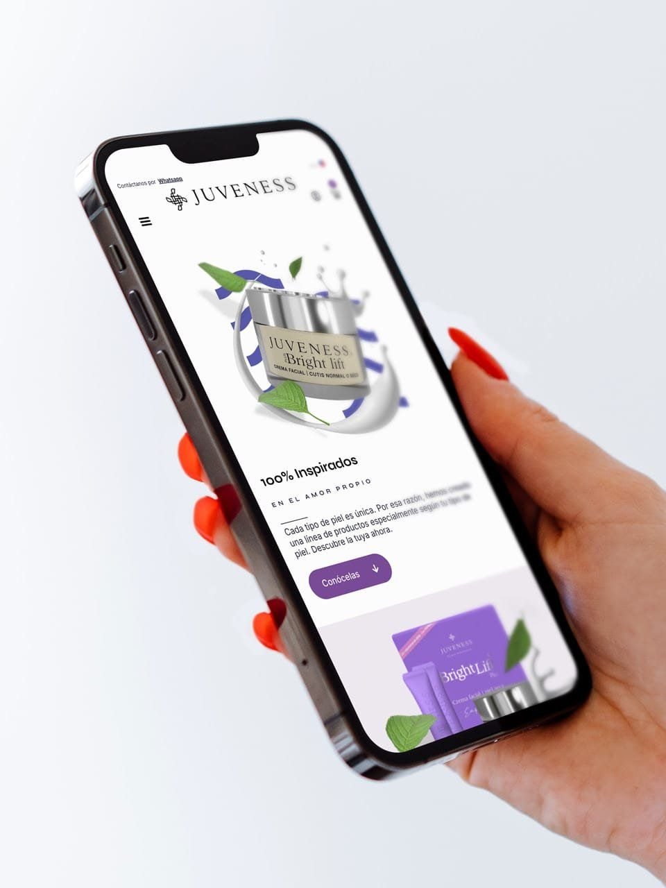 A phone in hand showing the Juveness store